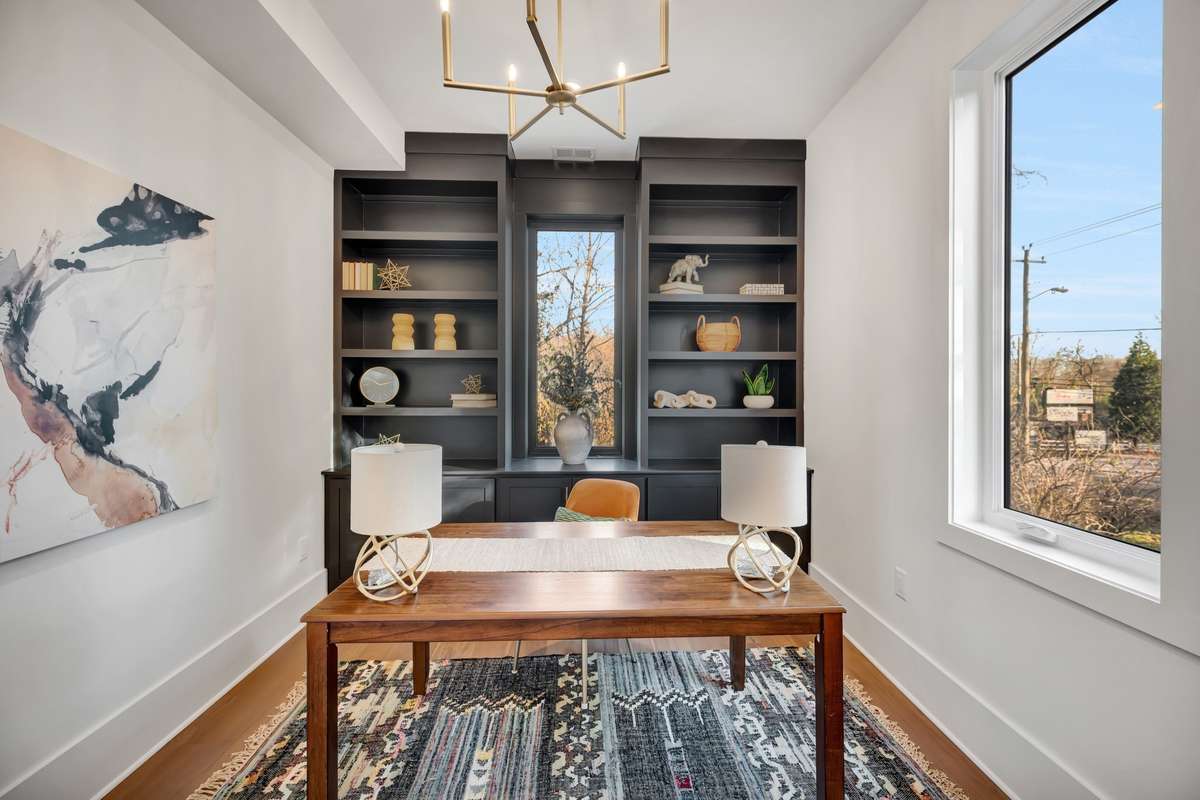 Bedroom/ Study option on the main level just off the Dining Area. That includes Builtins, Full Bath, Walk-in Closet