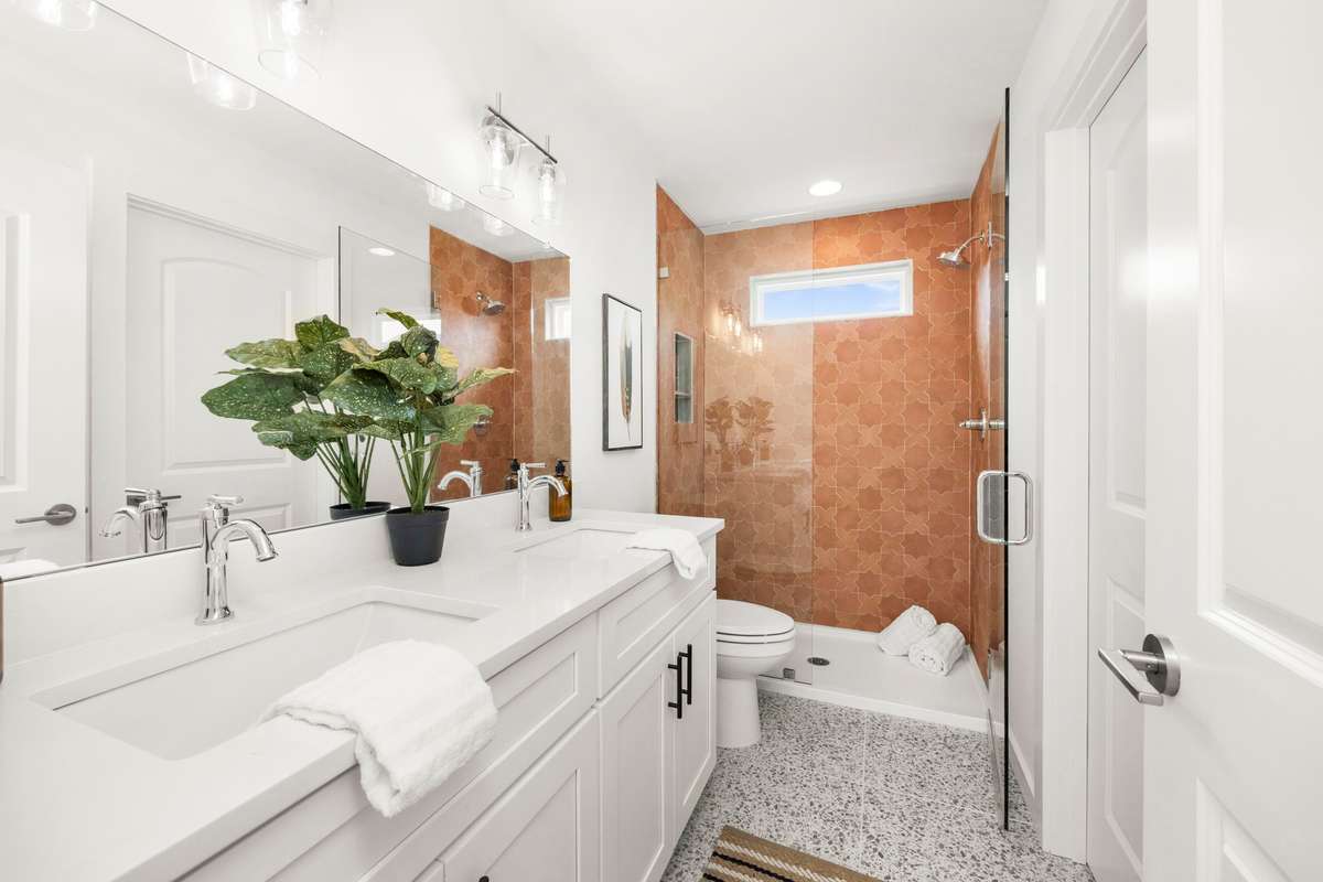 Primary Bathroom (Opens to Hallway and Primary Bedroom)