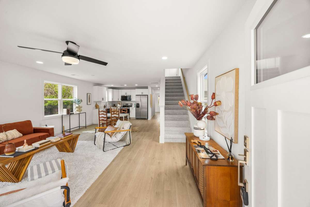 Enter into your spacious and beautiful living area that flows into your dining and kitchen space