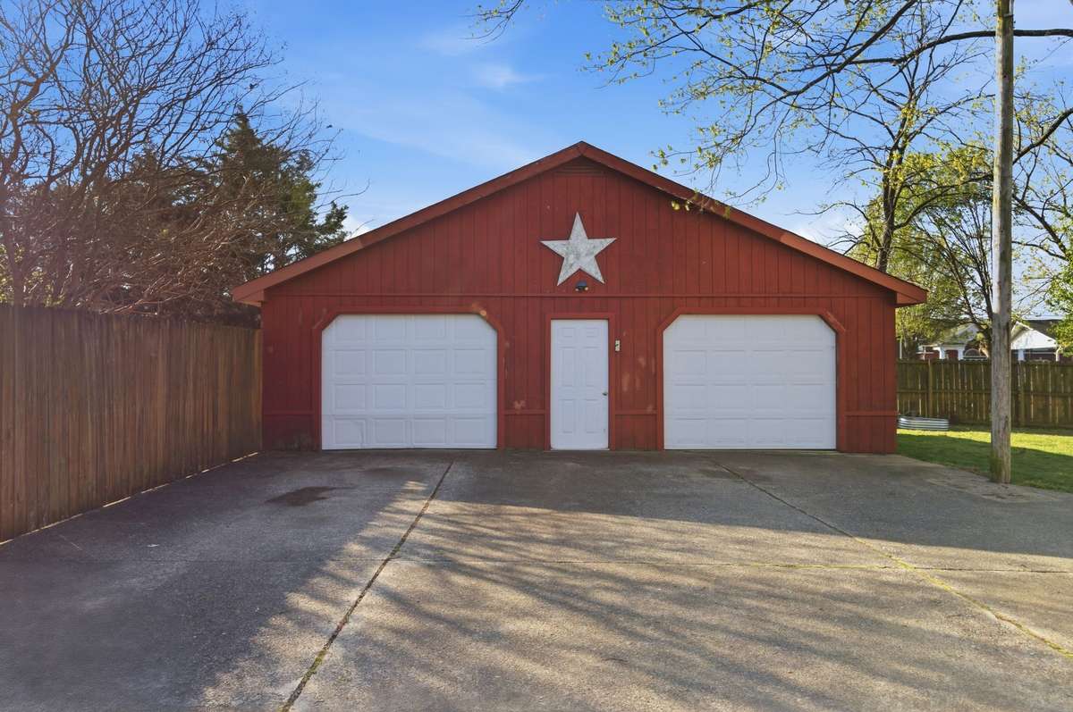 Another photo of the DETACHED GARAGE.  For those with boats, motorcycles, UTV's, etc., there's plenty of room in the 32'x32' Detached Garage.
