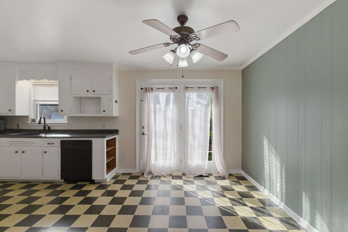 The Dining Area from this view, with the Kitchen to the left.