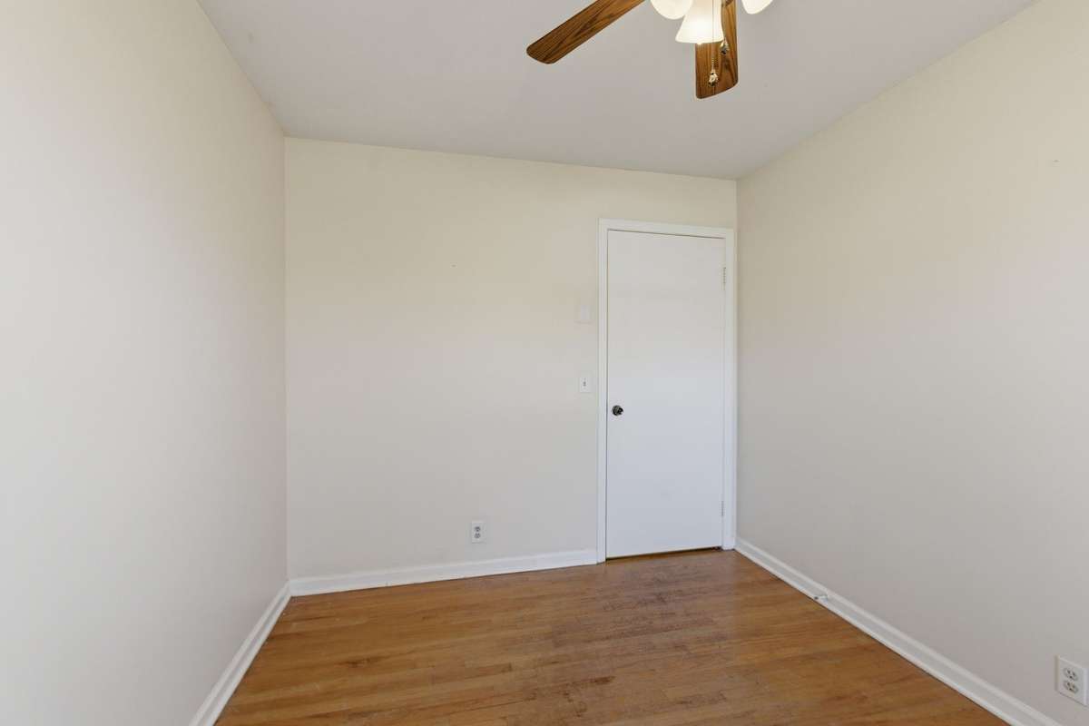 Bedroom #3 features Original HARDWOOD FLOORS.