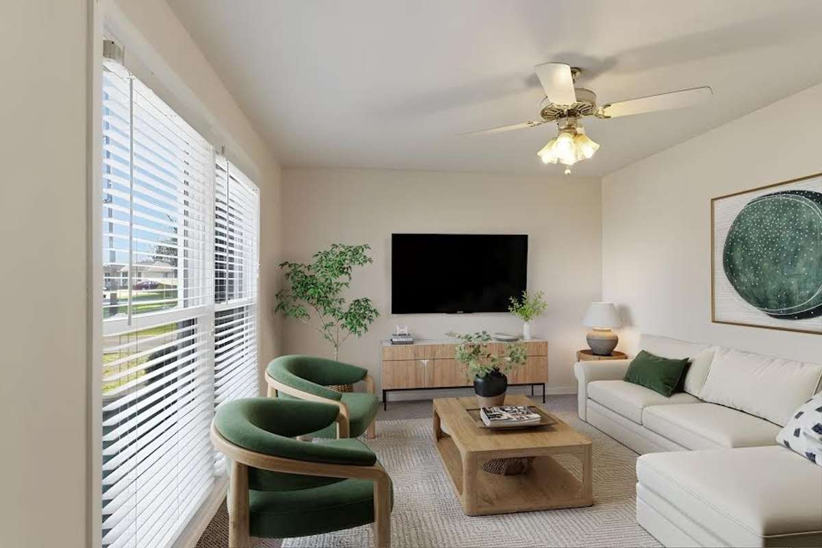 The Living Room features Double Windows and a Ceiling Fan.