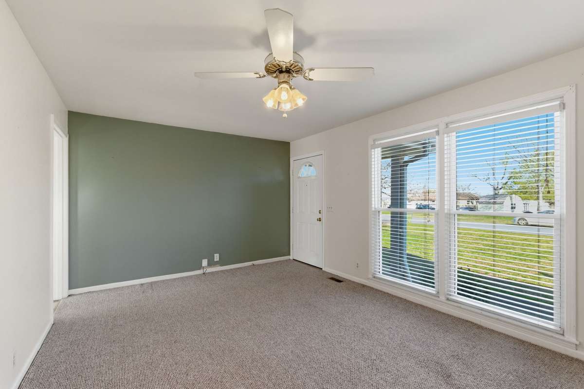 A "NEW" CEILING FAN will remain (in the box) for the new homeowners, although the current ceiling fan operates properly.