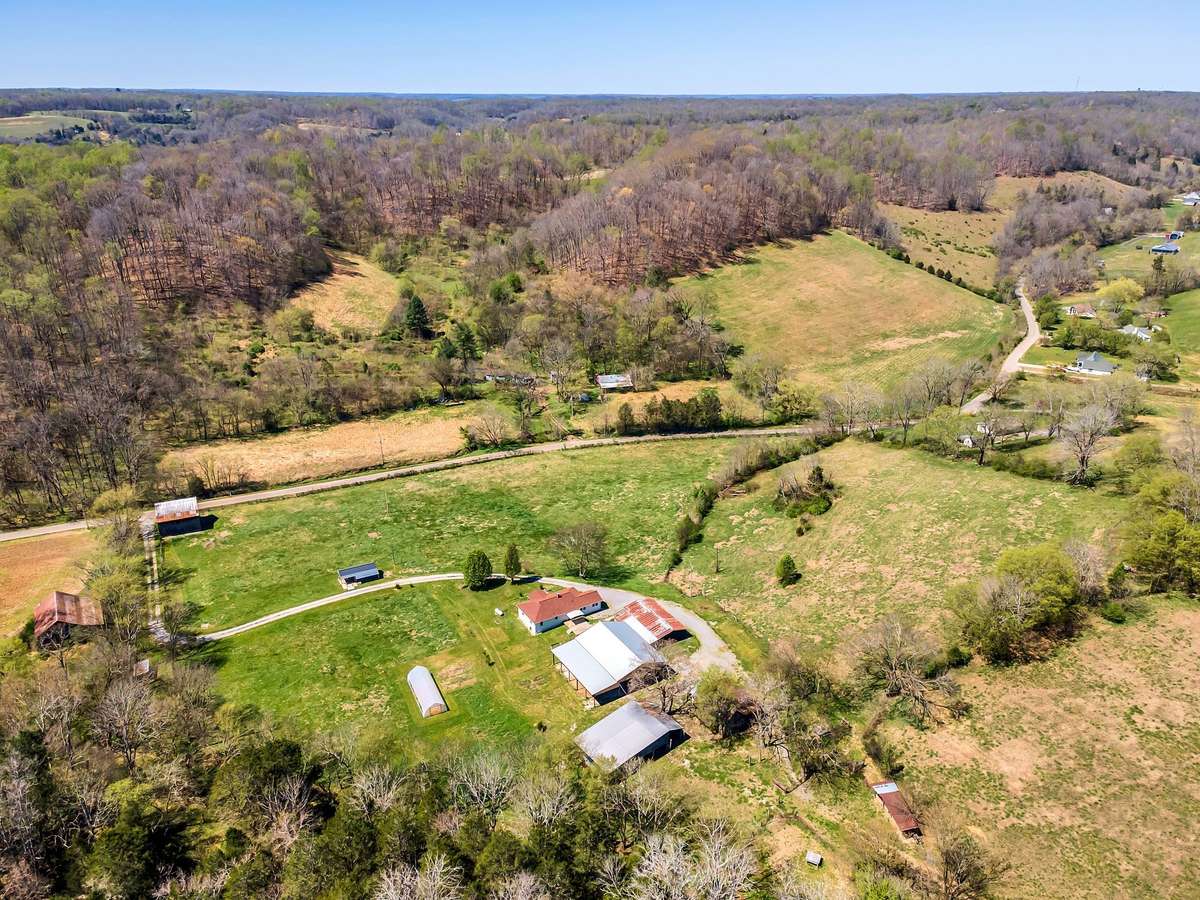 This view from the back shows the buildings, home and the front pasture areas.