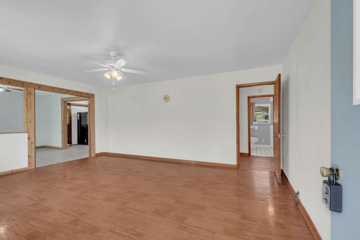 Enter the front door into the large living room that's ready for either a gas or wood burning fireplace.