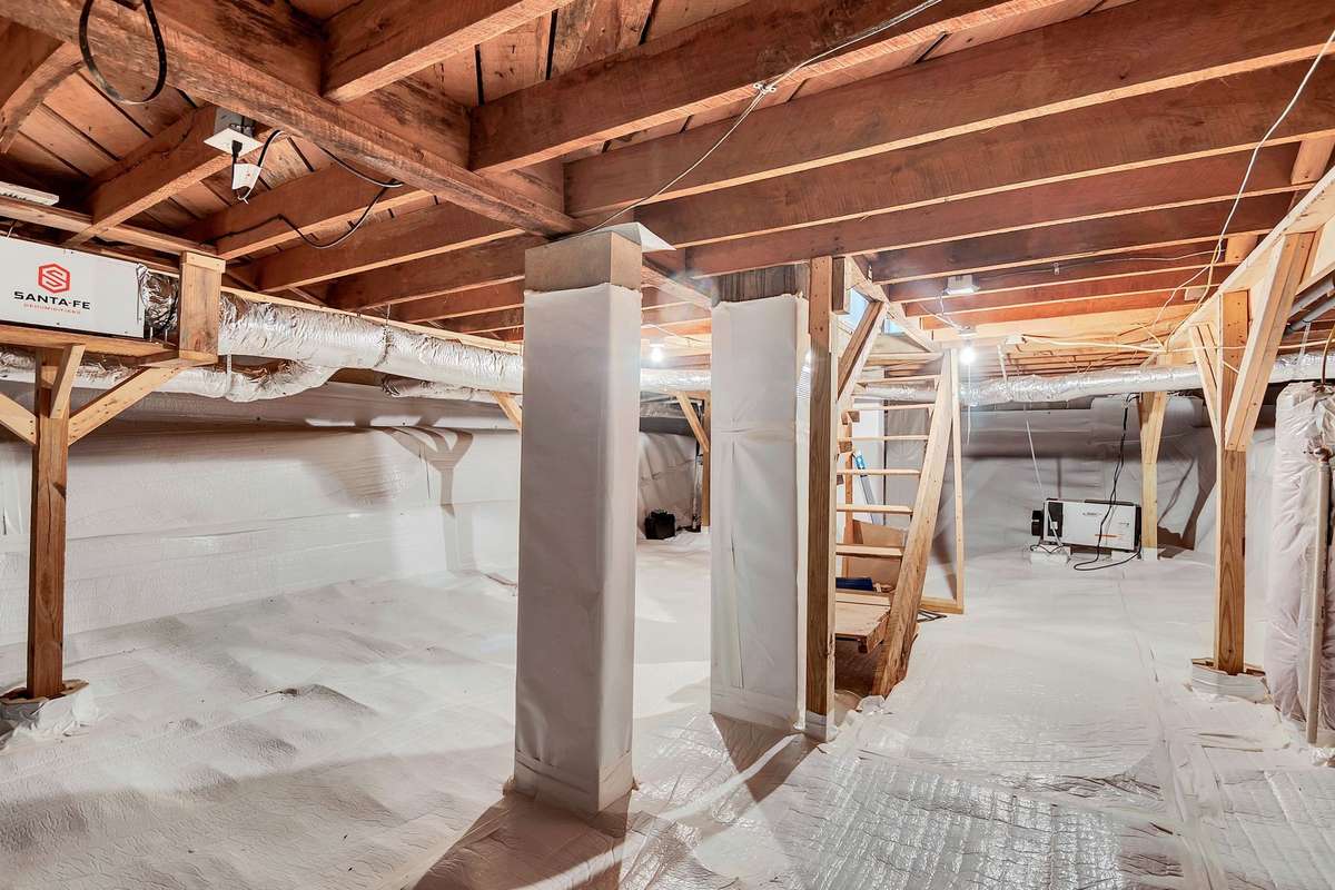 Off the kitchen you'll find a huge cellar/crawlspace that's perfect for storage and can double as a storm shelter.