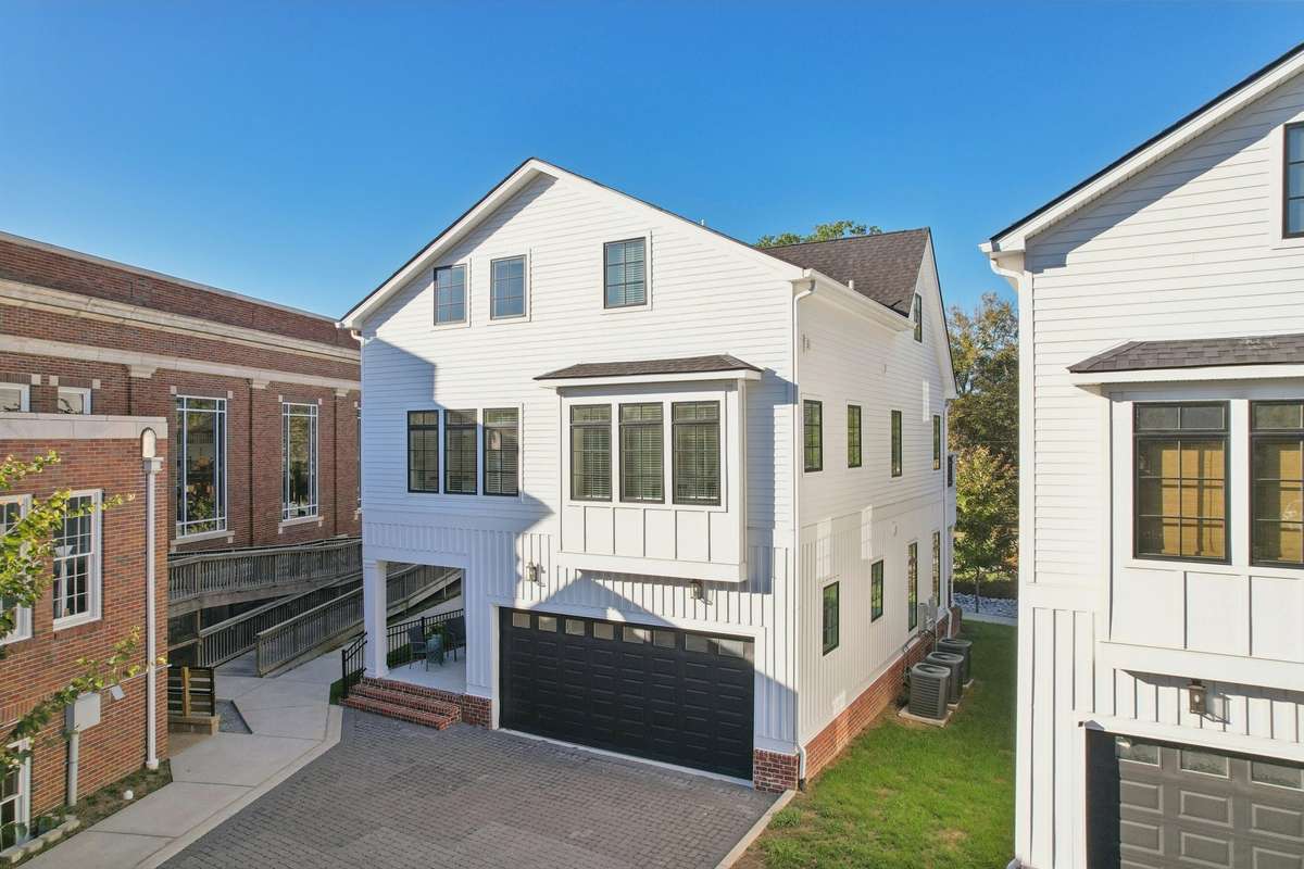 Back of house with ample parking, next to Butterlamp Wine Bar