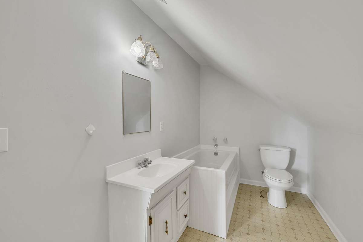 It also has a full bath with tub adjoining it.