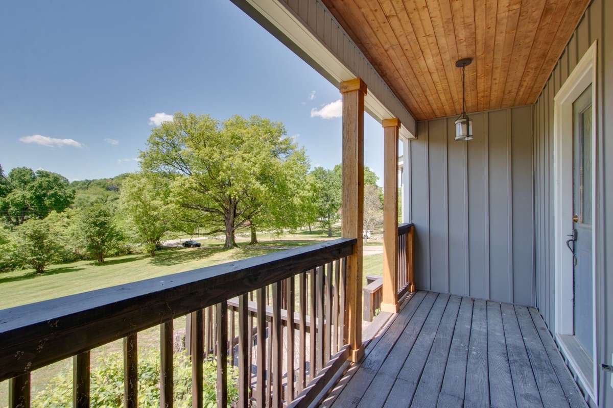 Wonderful front porch with updates and a view that is magnificent.  Posts and rails have been updated.