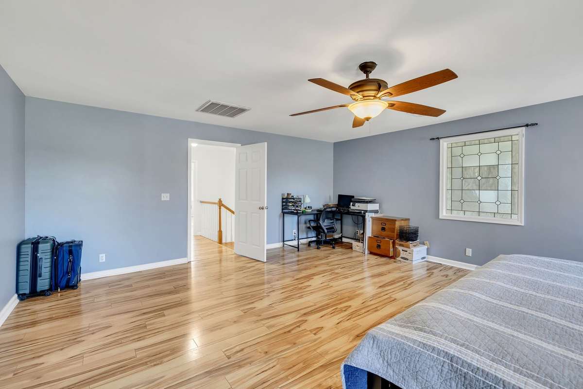 One of two rooms located upstairs.