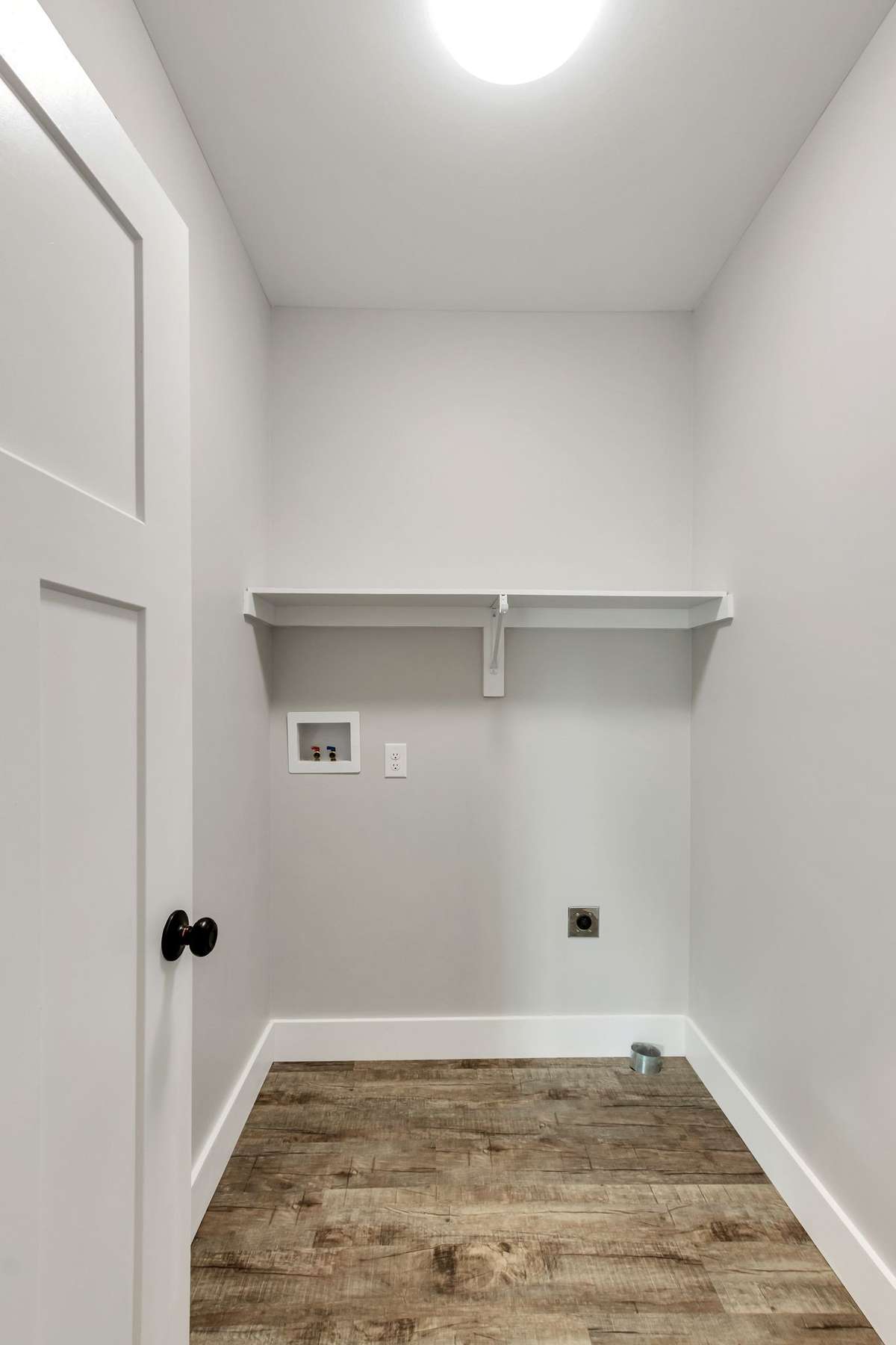 Laundry room with extra space for Hampers, hanging clothes or more storage
