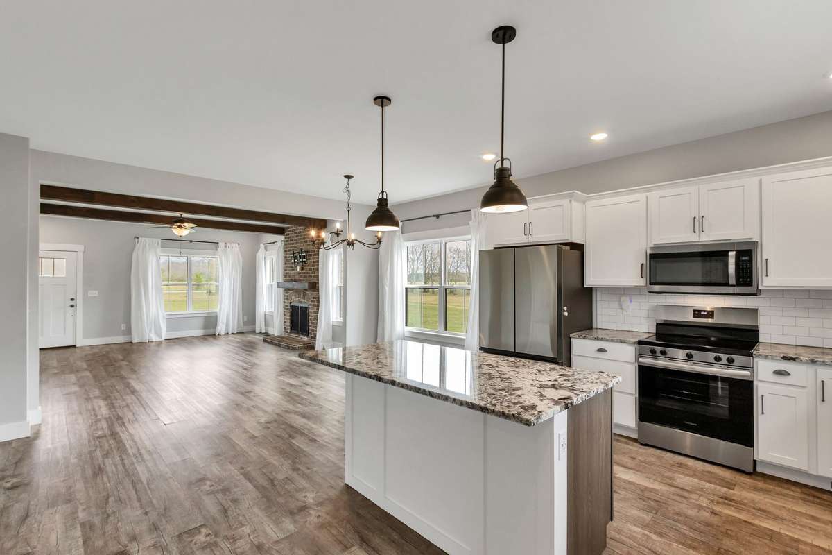 Another view of the amazing kitchen open to the living area