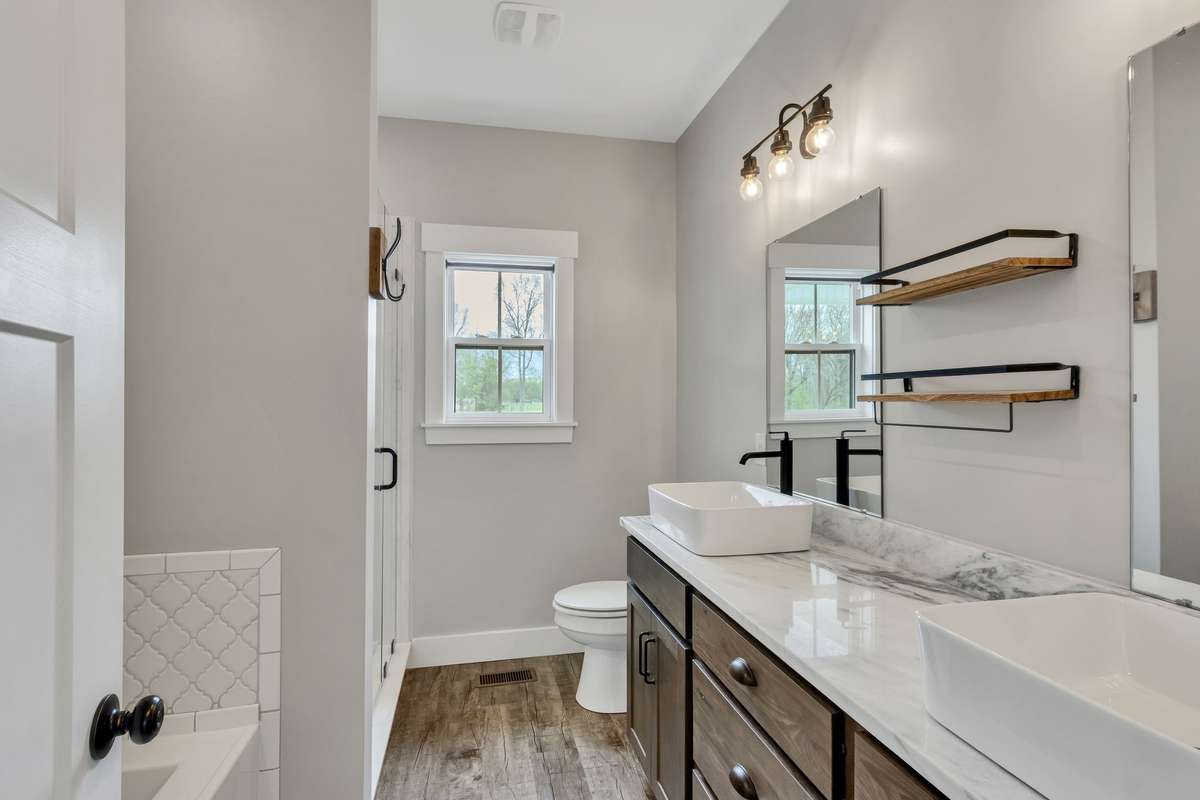 Primary bath with double vanity, soaking tub and separate shower