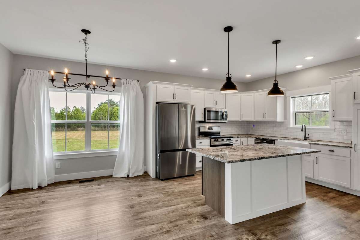 The kitchen window overlooks your expansive backyard