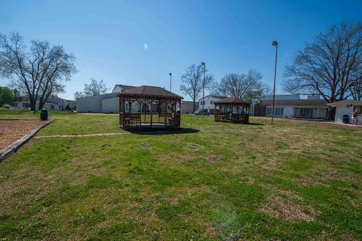 Covered Seating Near Club House with Playground Near by
