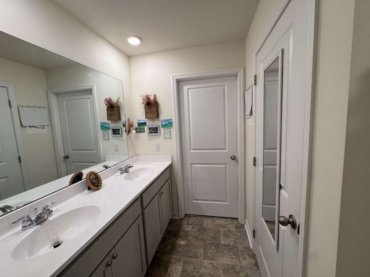 Primary Bath - Double Vanities with walk in closet and toilet closet