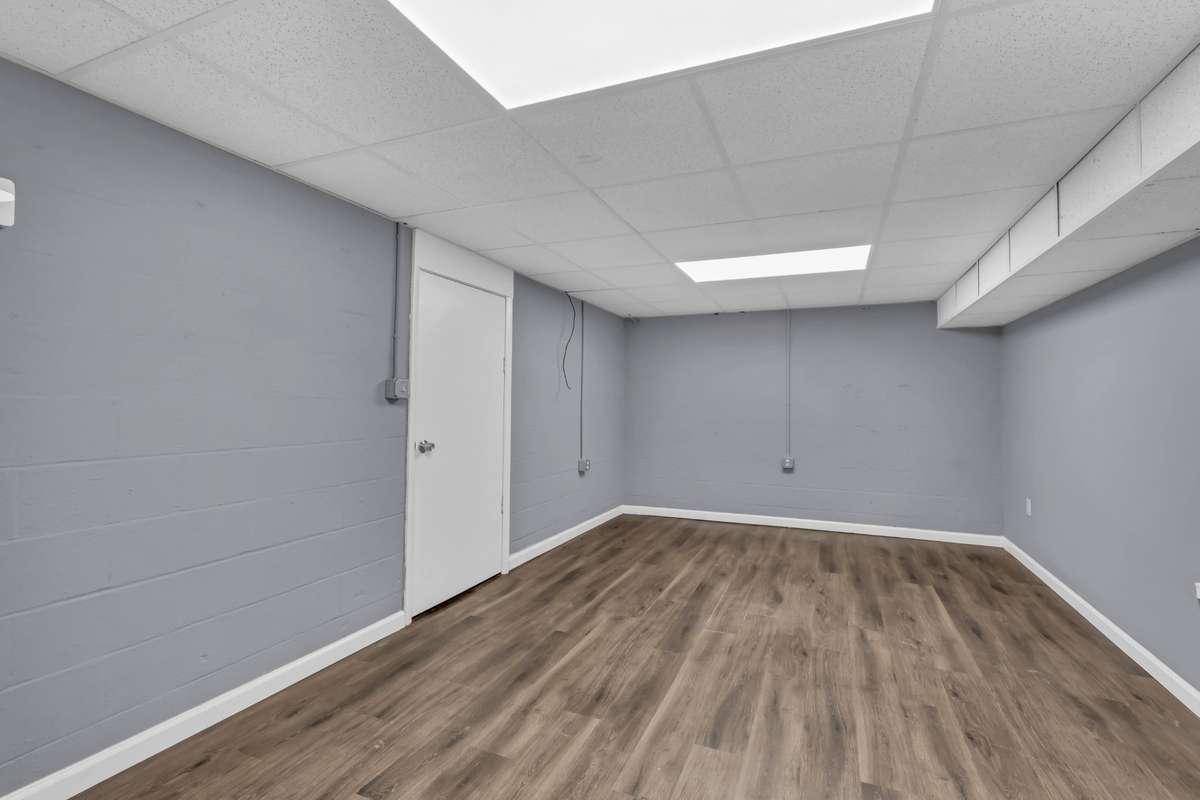Basement study with storm shelter and closet