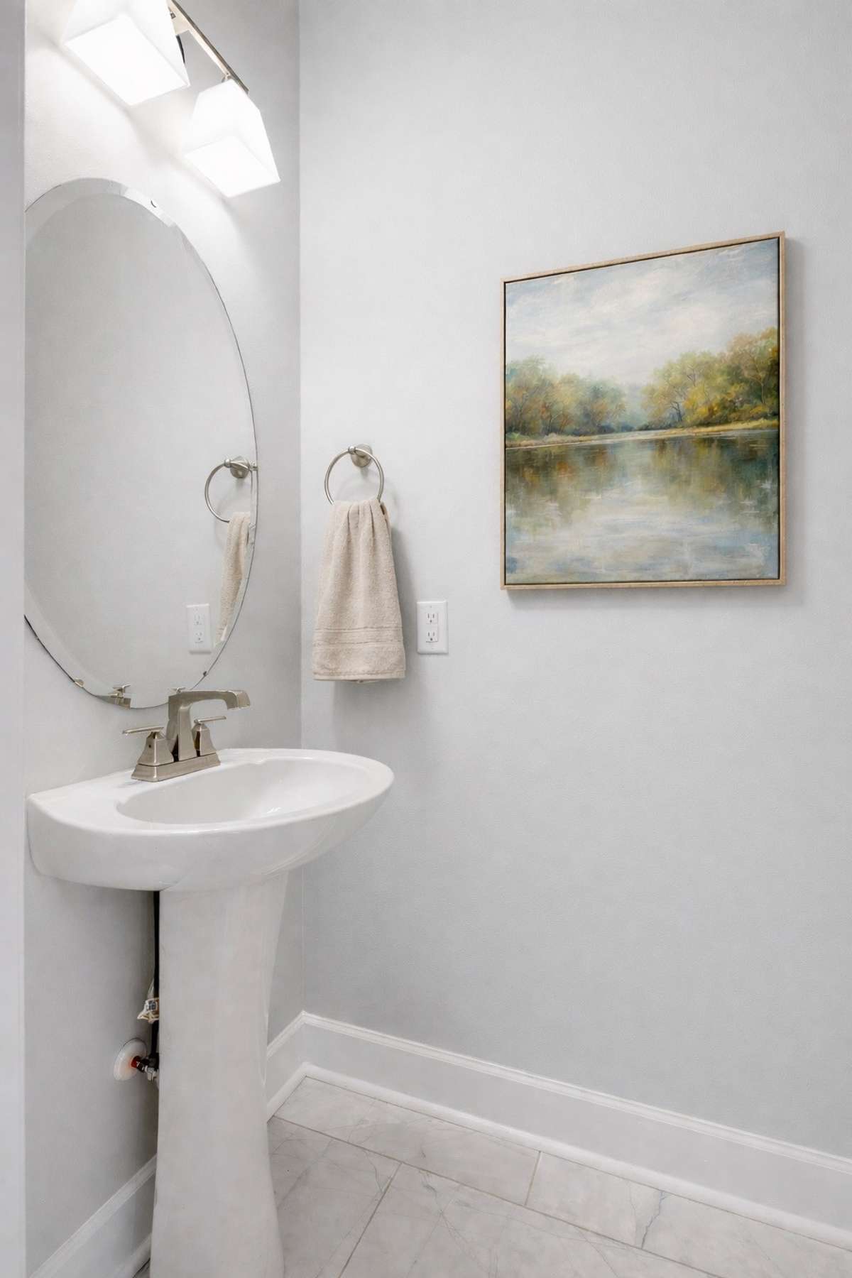 Half bath on first floor-  Digitally staged
