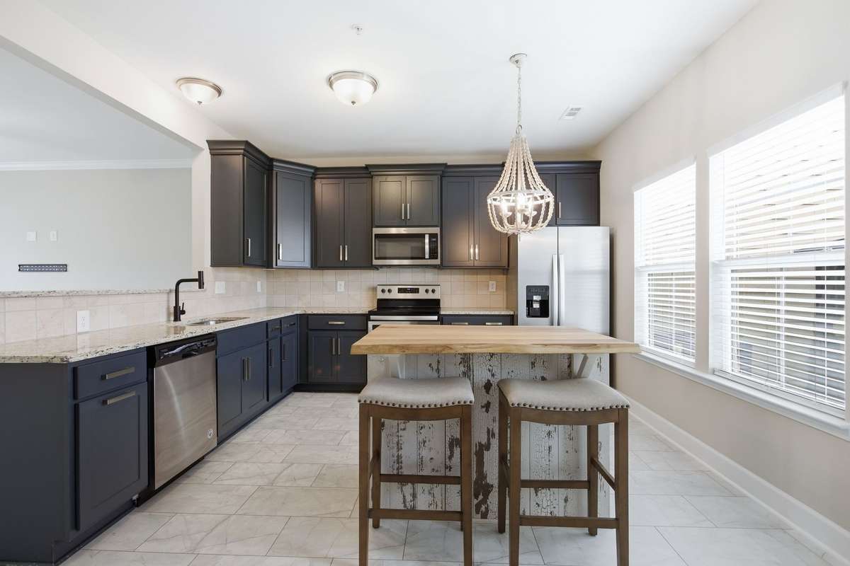 Bright and open kitchen overlooks the private courtyard