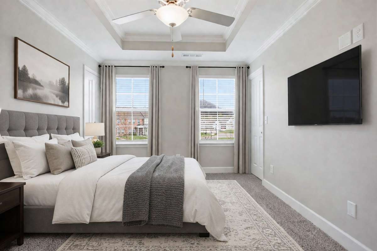Primary Bedroom with 2 closets and an ensuite bathroom- Digitally staged photo