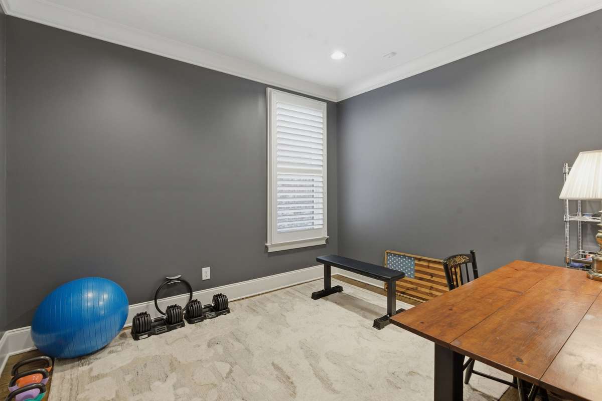 Main level flex space. Wonderful place for an office, workout room or an additional bedroom.