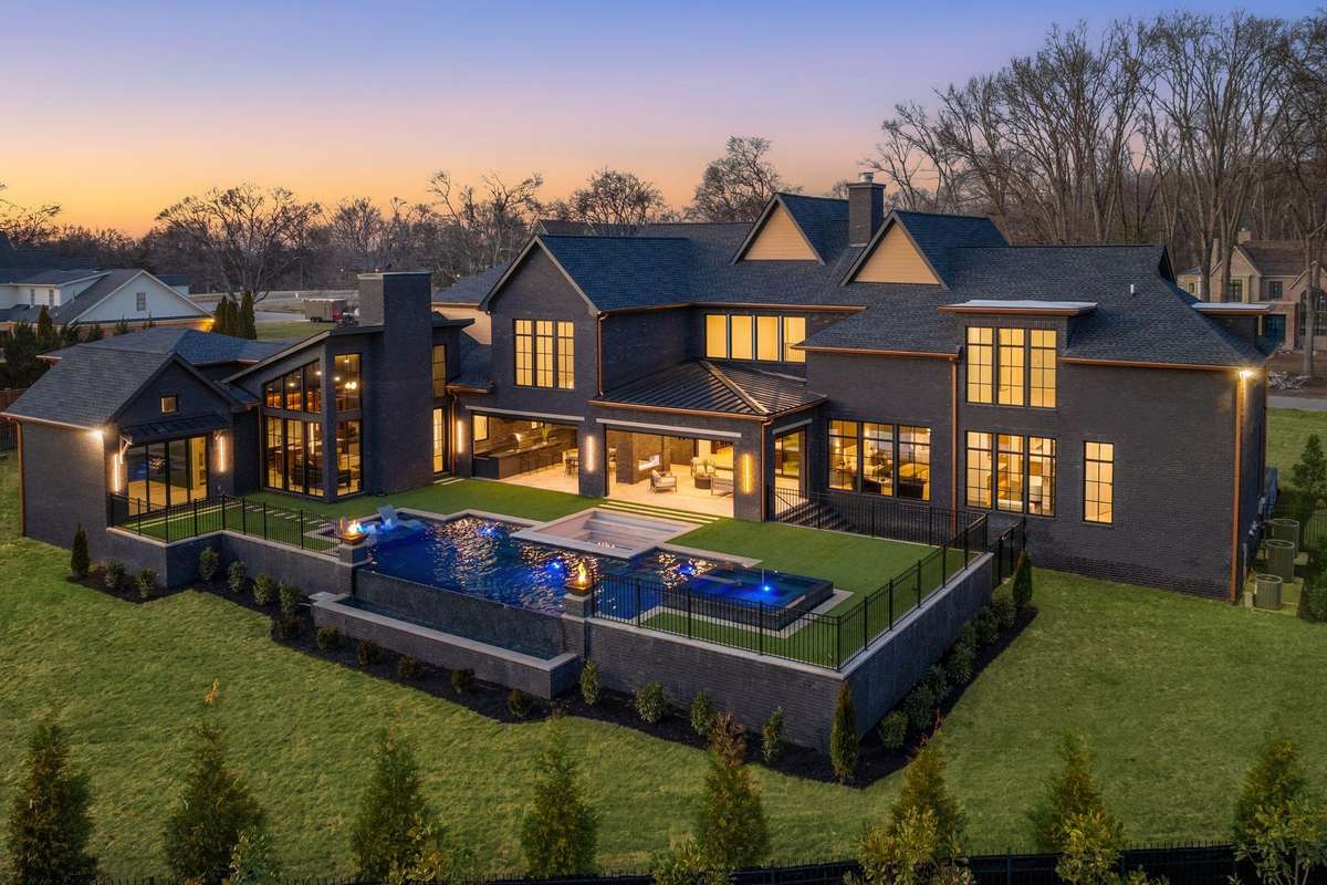 Stately and richly appointed, this home showcases extraordinary upgrades and one-of-a-kind features, complemented by a true outdoor oasis.