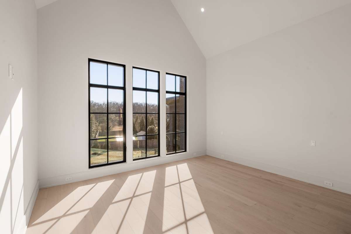 Upstairs you will find three additional bedrooms. All are bright and spacious with soaring ceilings and oversized windows.