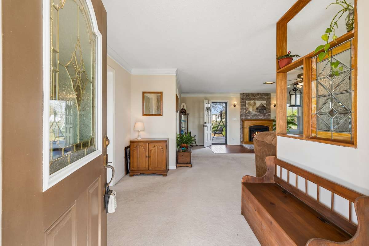 Step inside and feel the warmth of this ranch style home