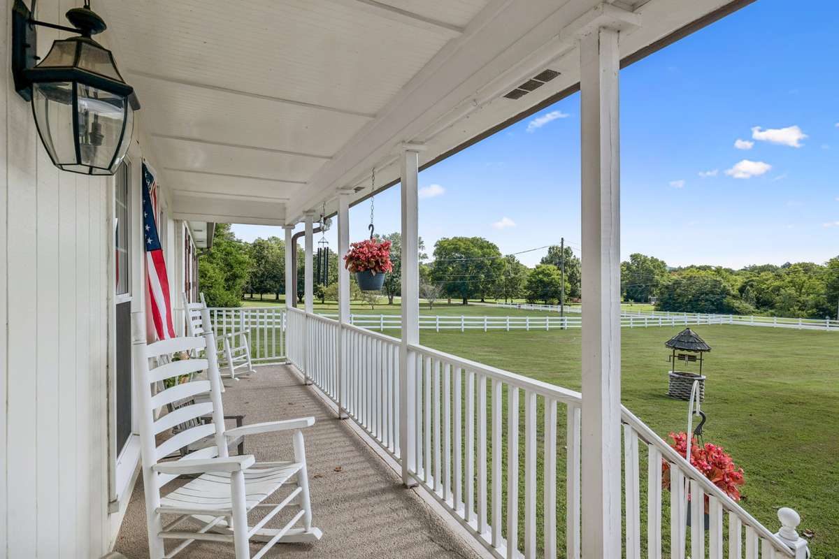 Welcome to Tennessee living!  A front porch made for rocking chairs and sweet tea.