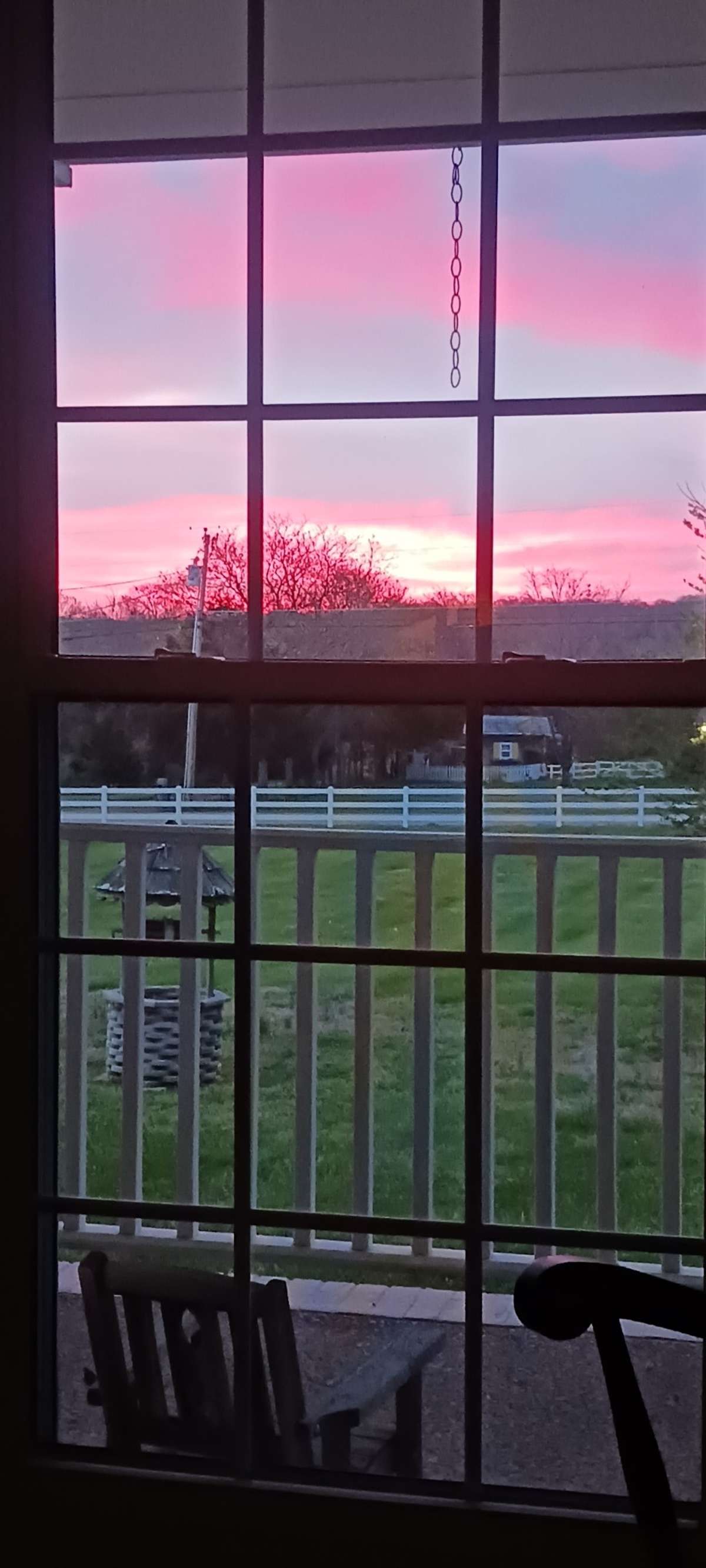 NOT EDITED:   Looking from the living room window- sunrise