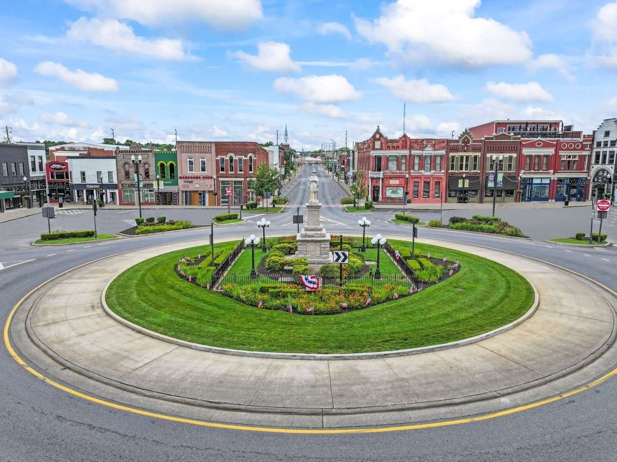 This square is home to a butcher, baker, and a craft beer maker.