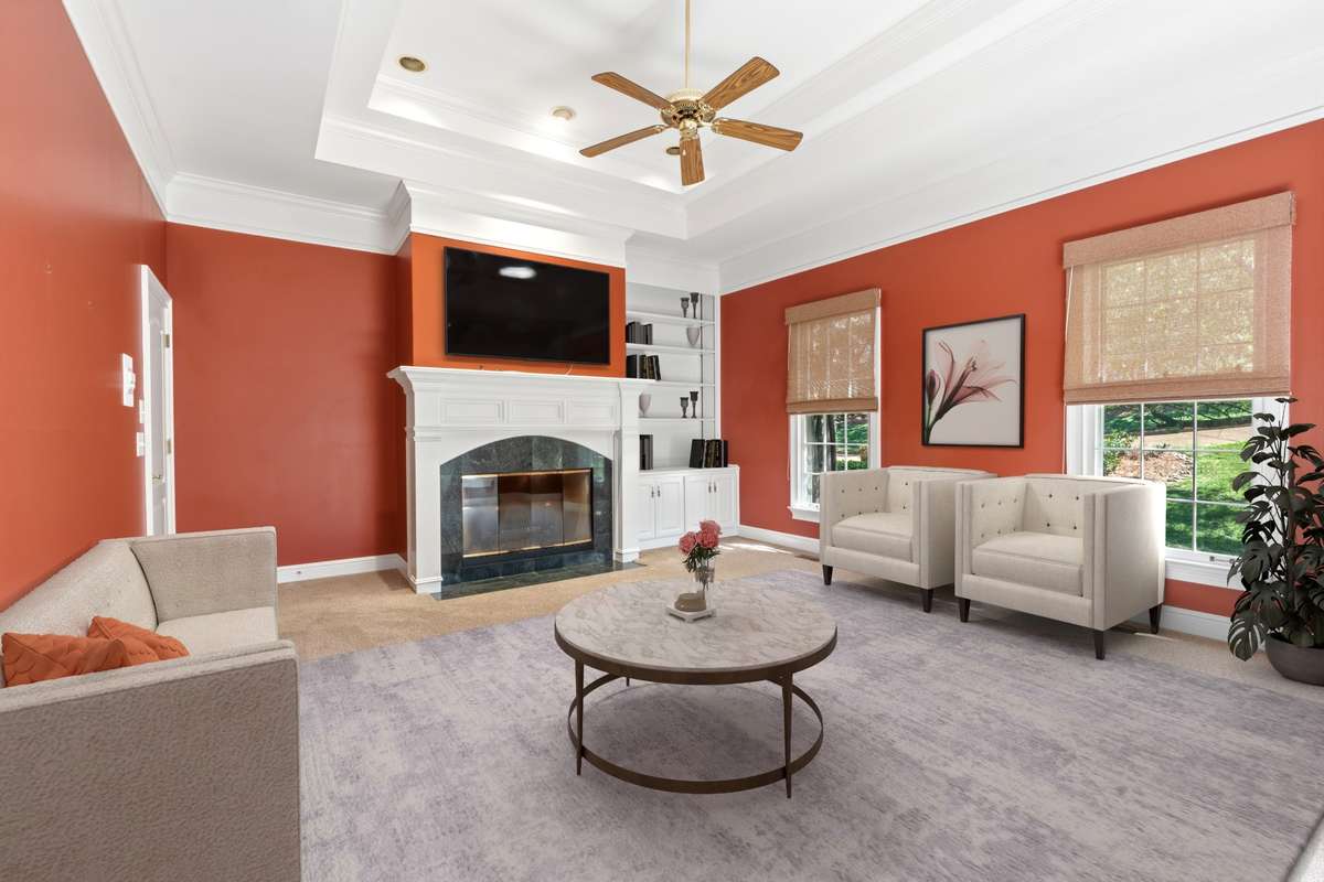 Den off kitchen with foreplace