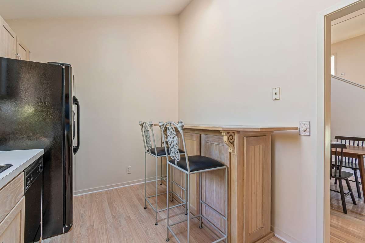 This bar was added for additional storage. It is not affixed, but remains with the property.