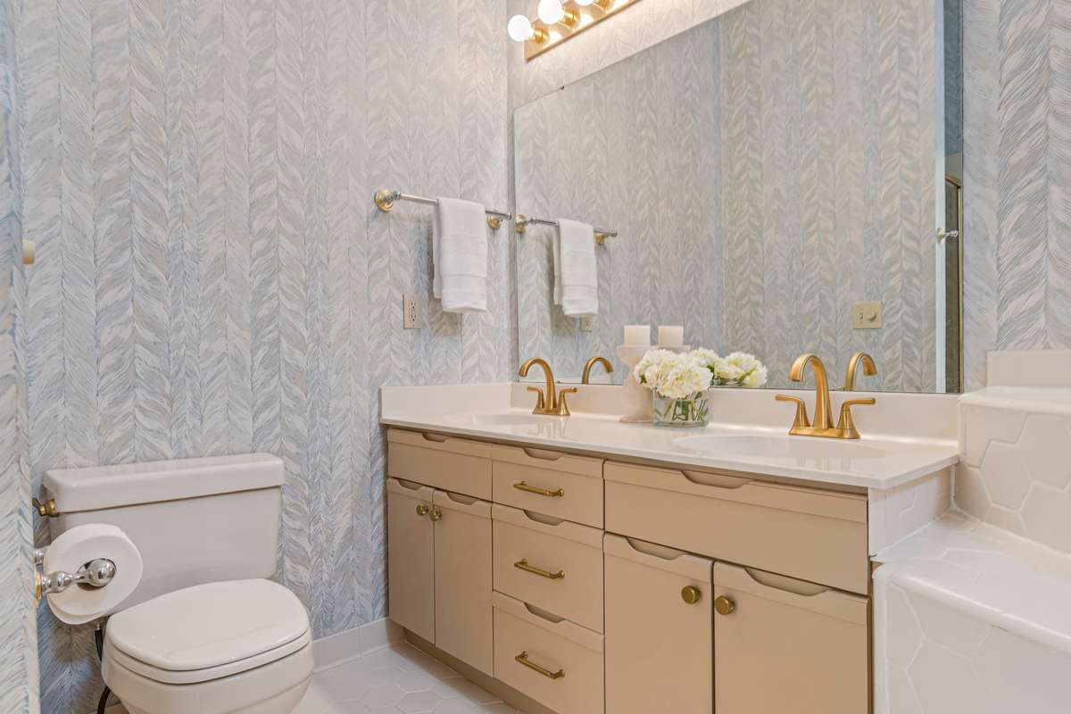 This dual sink vanity provides plenty of counter space and storage.
