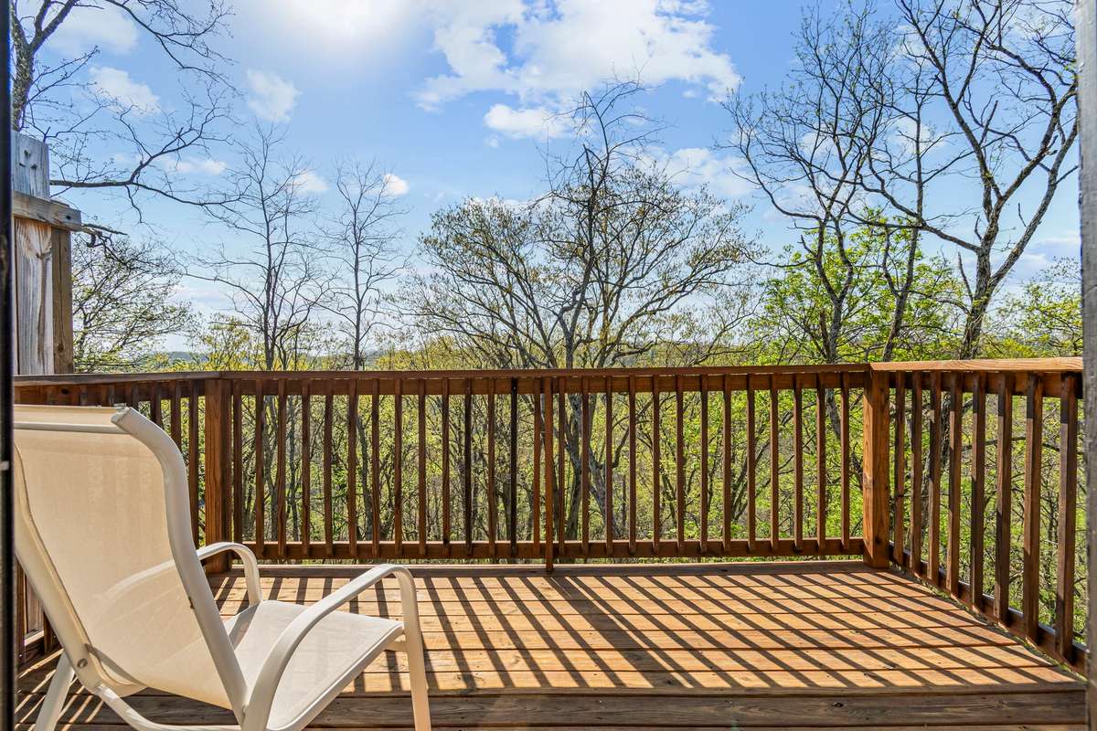 Enjoy mornings and views on this deck; right outside of the primary bedroom.