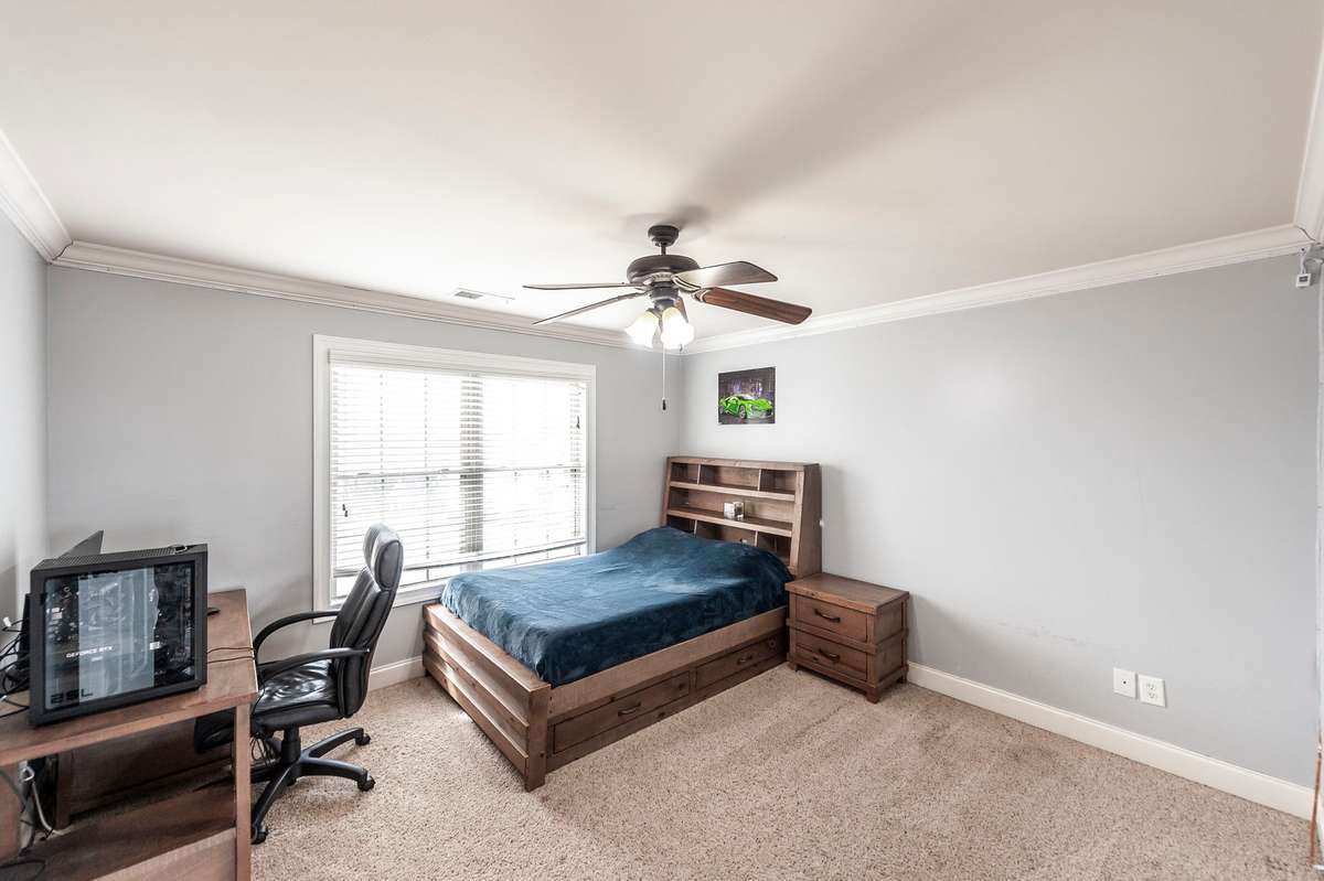 The third bedroom is located on the second floor and offers generous closet space.