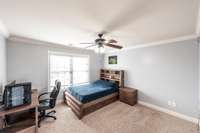 The third bedroom is located on the second floor and offers generous closet space.
