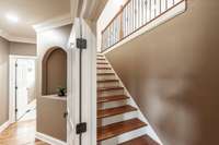 A secondary staircase located off the kitchen leads to the bonus room, providing easy and convenient access.