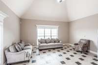 In addition to the formal dining room, the kitchen features a casual dining area for everyday meals which is presently used for an extra seating area.
