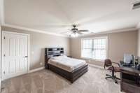 The fourth bedroom includes a full bath conveniently adjoining for added comfort.