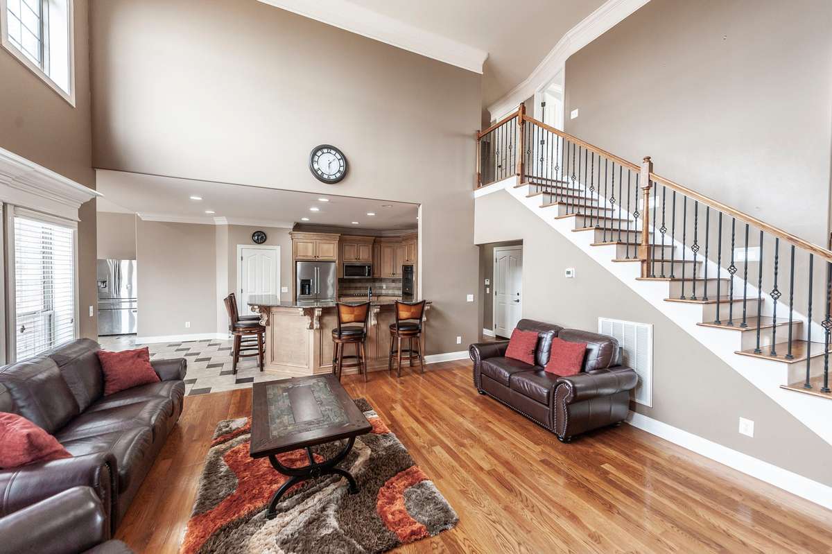 The gourmet kitchen opens to the great room, creating a spacious, connected layout perfect for gatherings and everyday living.
