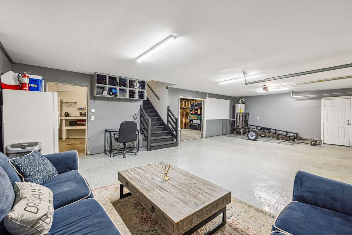 The basement has a two car garage. Sellers already had a sport room set up and one air vent down there. The basement and garage are so clean and neat