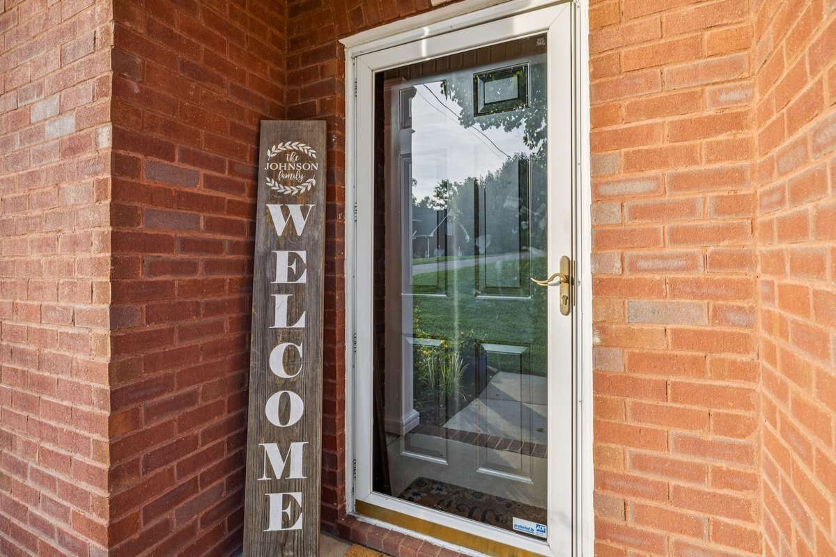 This porch comes off the kitchen and Utility/muddroom area. When you walk in you have a built in cubby for hanging your coats, bags and to remove your shoes.