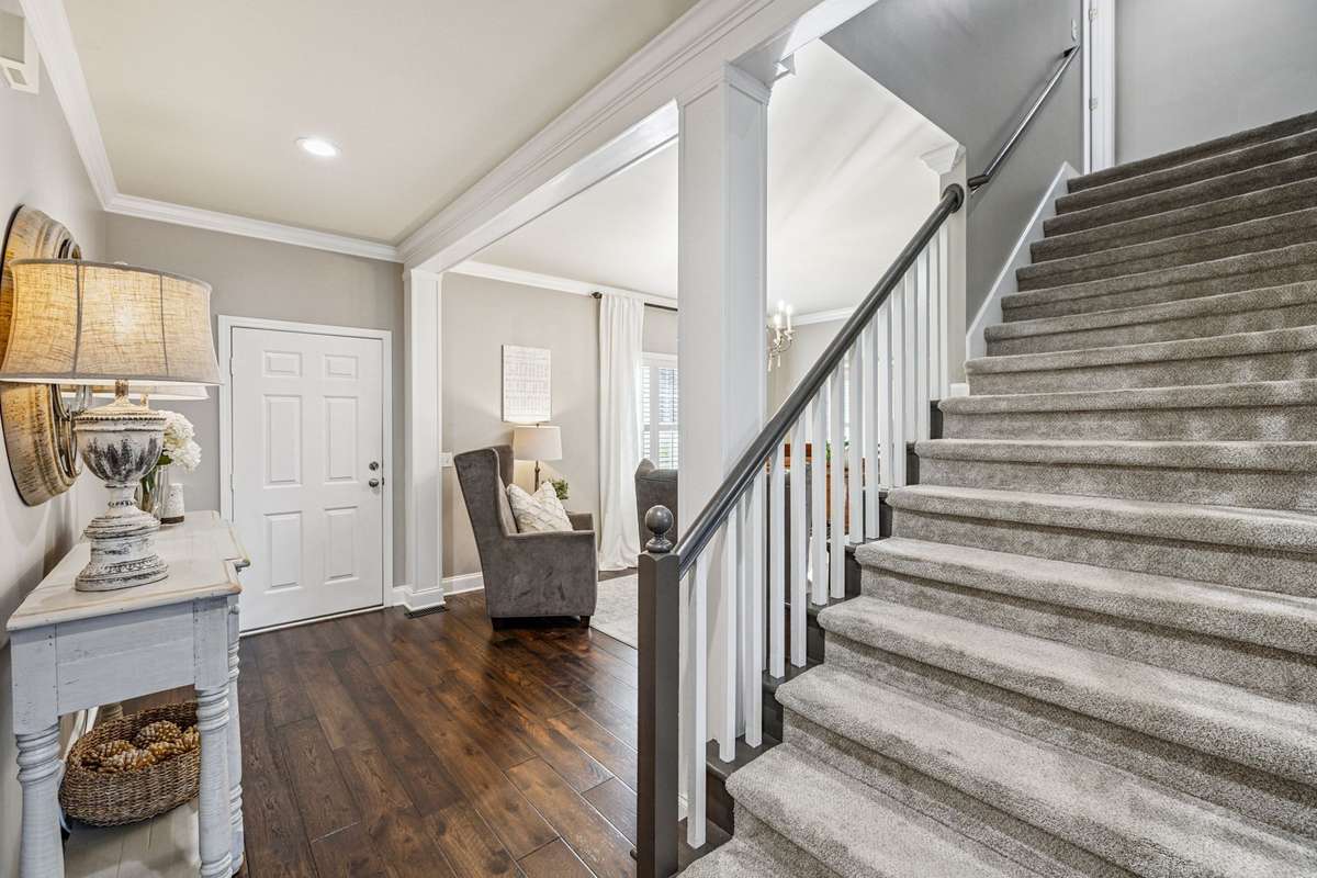 This home has a wide staircase leading to 3 BR, a Jack-n-Jill bath and a bonus room.