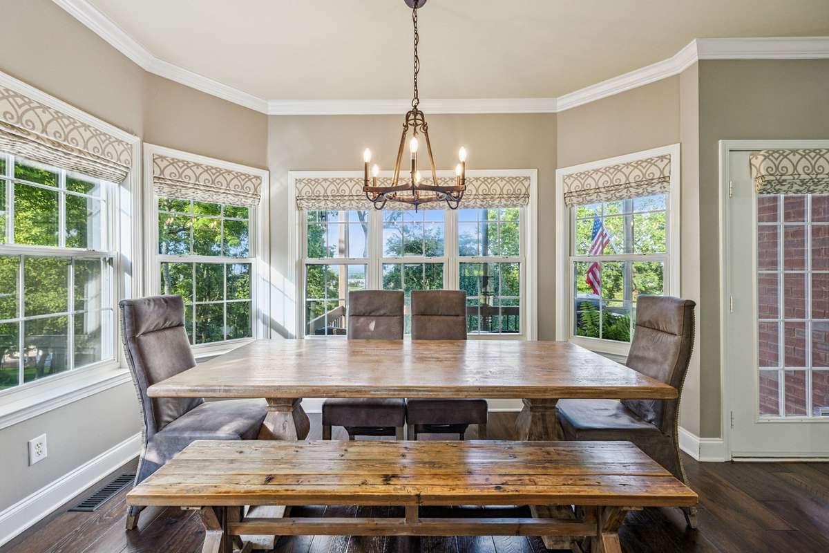 So much natural light and walk out on a covered grilling deck