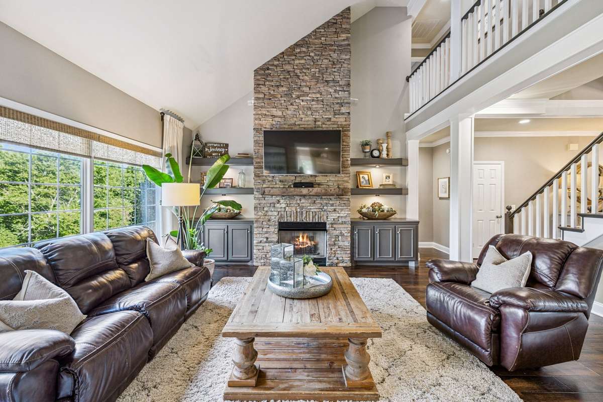 The stone fireplace, gas logs and views gives this room a retreat like feel.