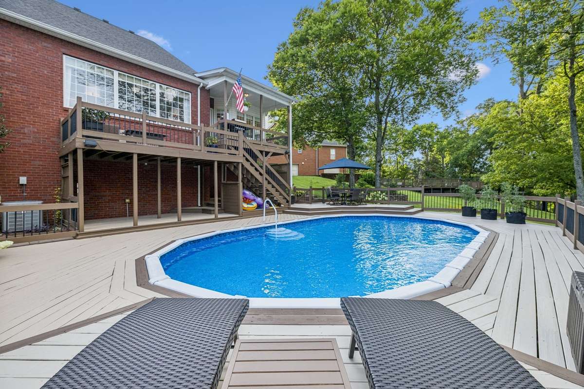Look how clean and well maintained this pool and deck is