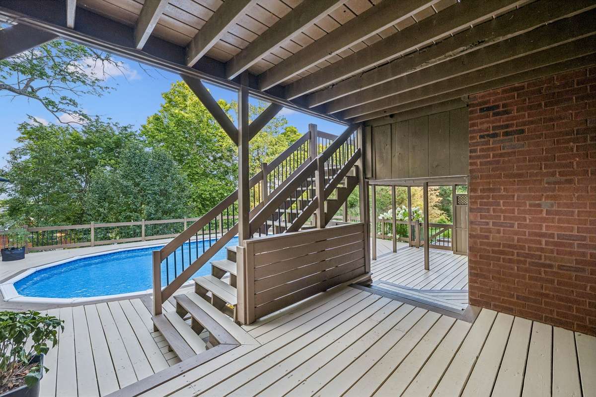 This space did have a hot tub. Plug already in place. Covered and could be used all year long. This would also be a great covered space for a table and chairs.