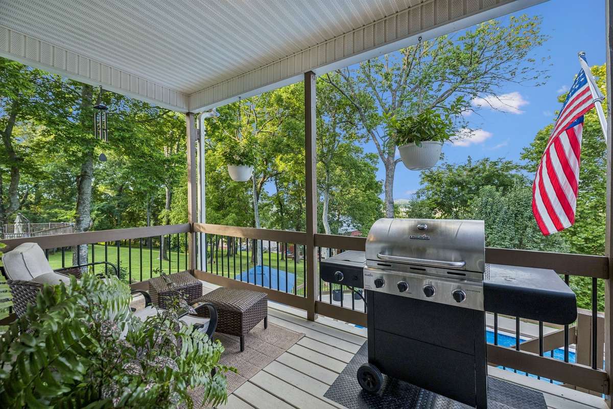 The back deck off the Kitchen and Breakfast Nook has plenty of room for the grill